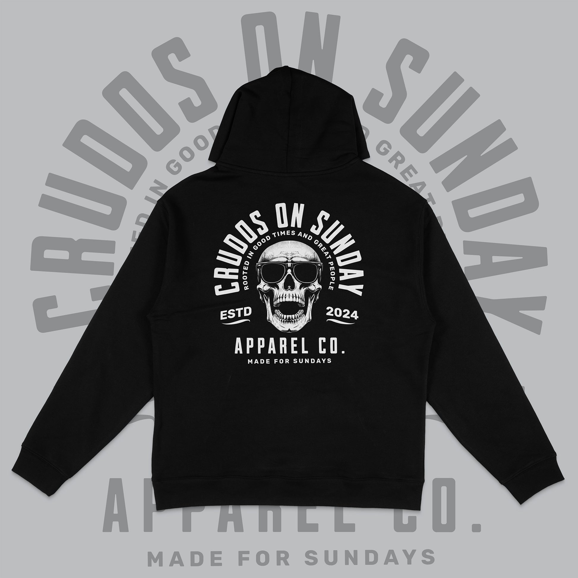 Black hoodie with skull graphic and text on a gray background