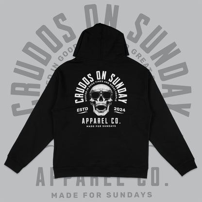 Black hoodie with skull graphic and text on a gray background